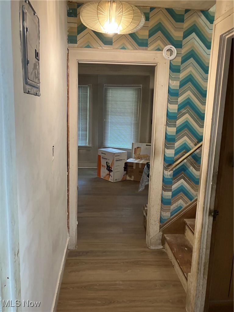 1058 Pembrook Road Cleveland Heights, OH 44121 - Photo 9 of 39 Hallway featuring dark wood-style floors and baseboards