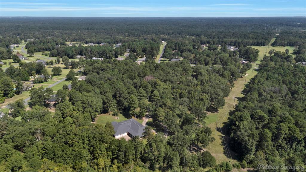 3669 Fountainbleau Road Keithville, LA 71047 - Photo 11 of 40 an aerial view of residential houses with city and green space
