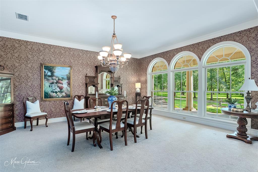 3669 Fountainbleau Road Keithville, LA 71047 - Photo 15 of 40 a view of a room with gym equipment