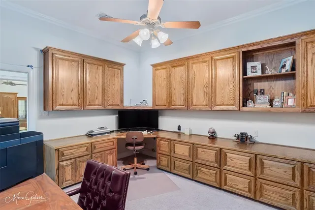 a kitchen with stainless steel appliances granite countertop a sink dishwasher stove and cabinets with wooden floor