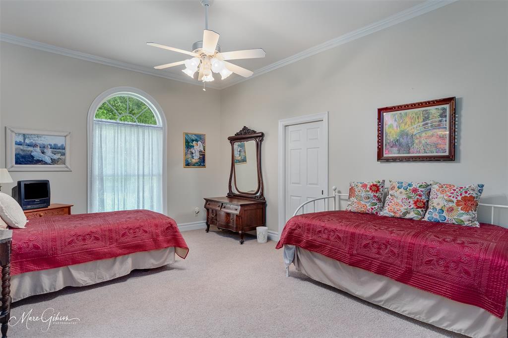 3669 Fountainbleau Road Keithville, LA 71047 - Photo 33 of 40 a bedroom with bed and window