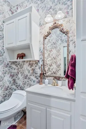 a bathroom with a sink and a toilet