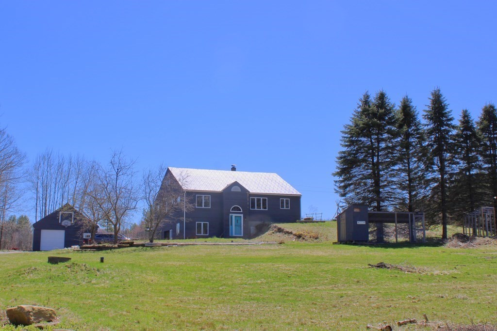 a house view with a garden space