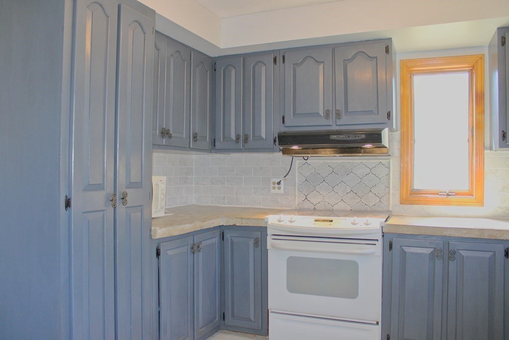 32 Hemlock Street Douglas, MA 01516 - Photo 11 of 41 a view of a kitchen with a sink