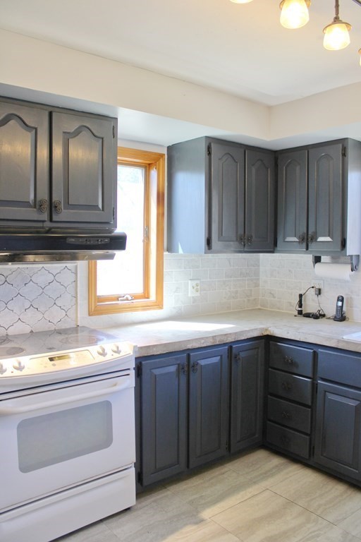 32 Hemlock Street Douglas, MA 01516 - Photo 13 of 41 a kitchen with a sink and cabinets