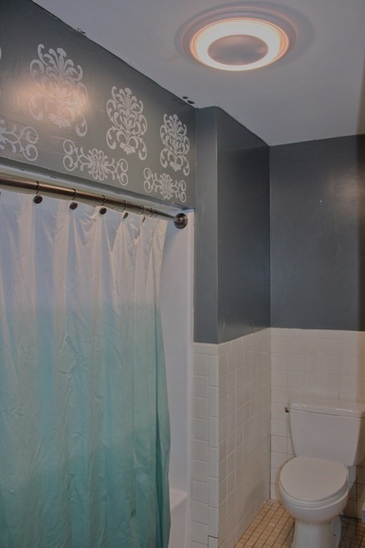 32 Hemlock Street Douglas, MA 01516 - Photo 23 of 41 a bathroom with a shower and a toilet