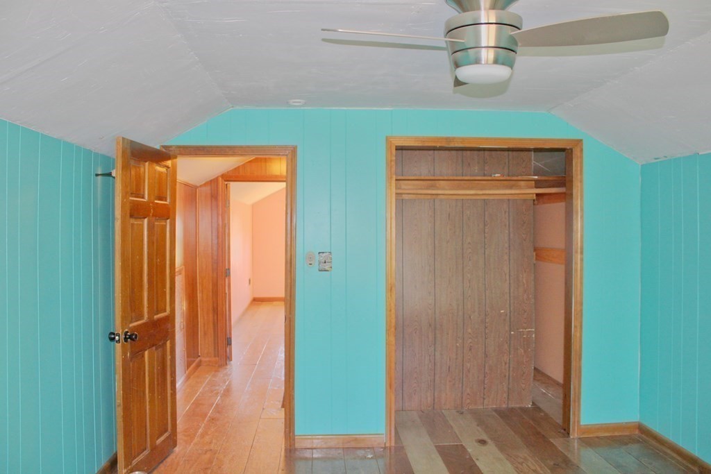 32 Hemlock Street Douglas, MA 01516 - Photo 24 of 41 an empty room with wooden floor and closet