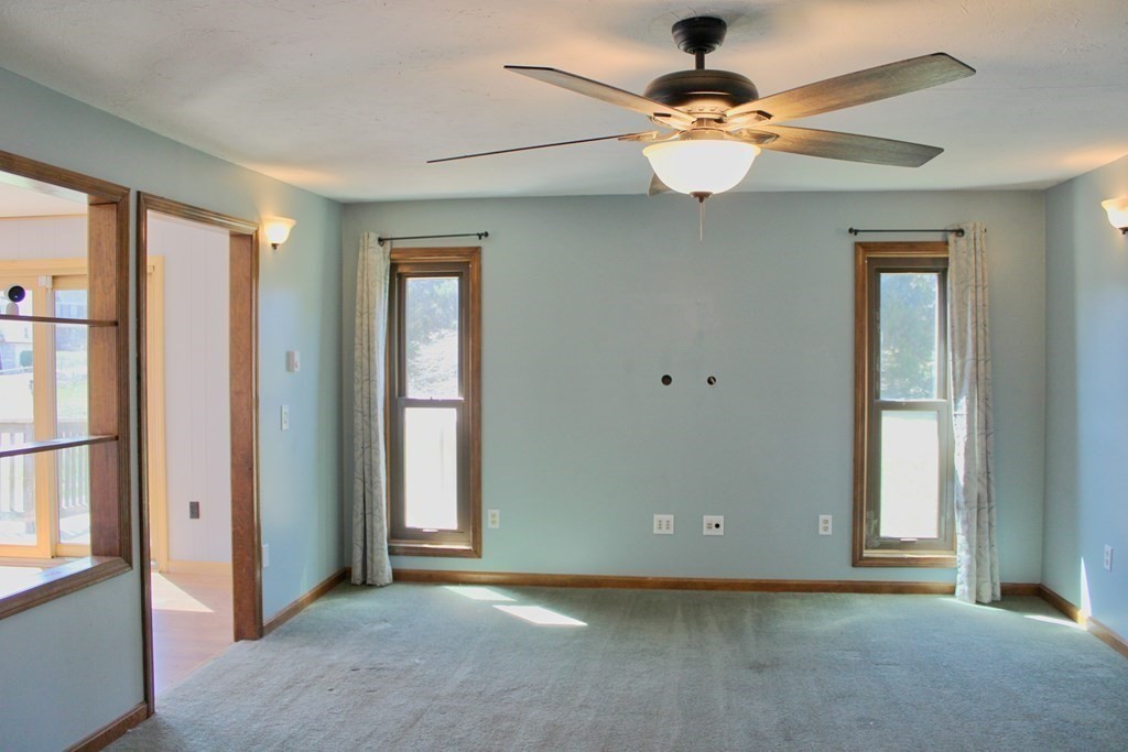 32 Hemlock Street Douglas, MA 01516 - Photo 6 of 41 wooden floor in an empty room with a window