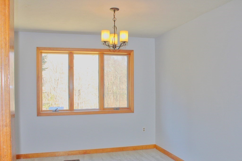 32 Hemlock Street Douglas, MA 01516 - Photo 9 of 41 a view of an empty room with a window
