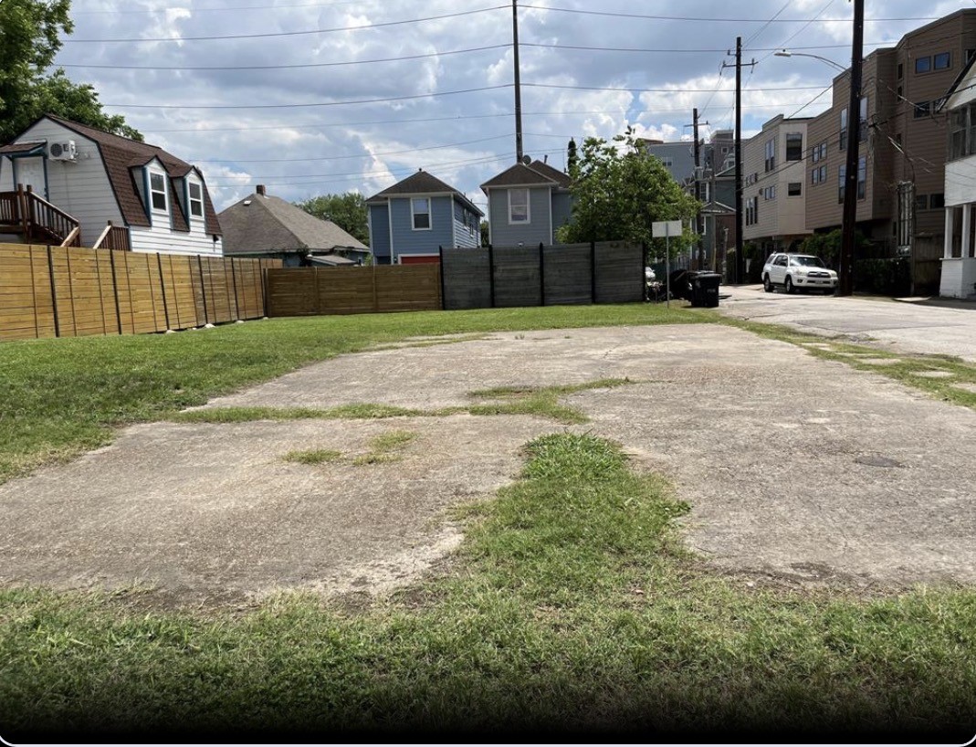 0 Wilson Street Houston, TX 77019 - Photo 2 of 4 a front view of a house with a yard