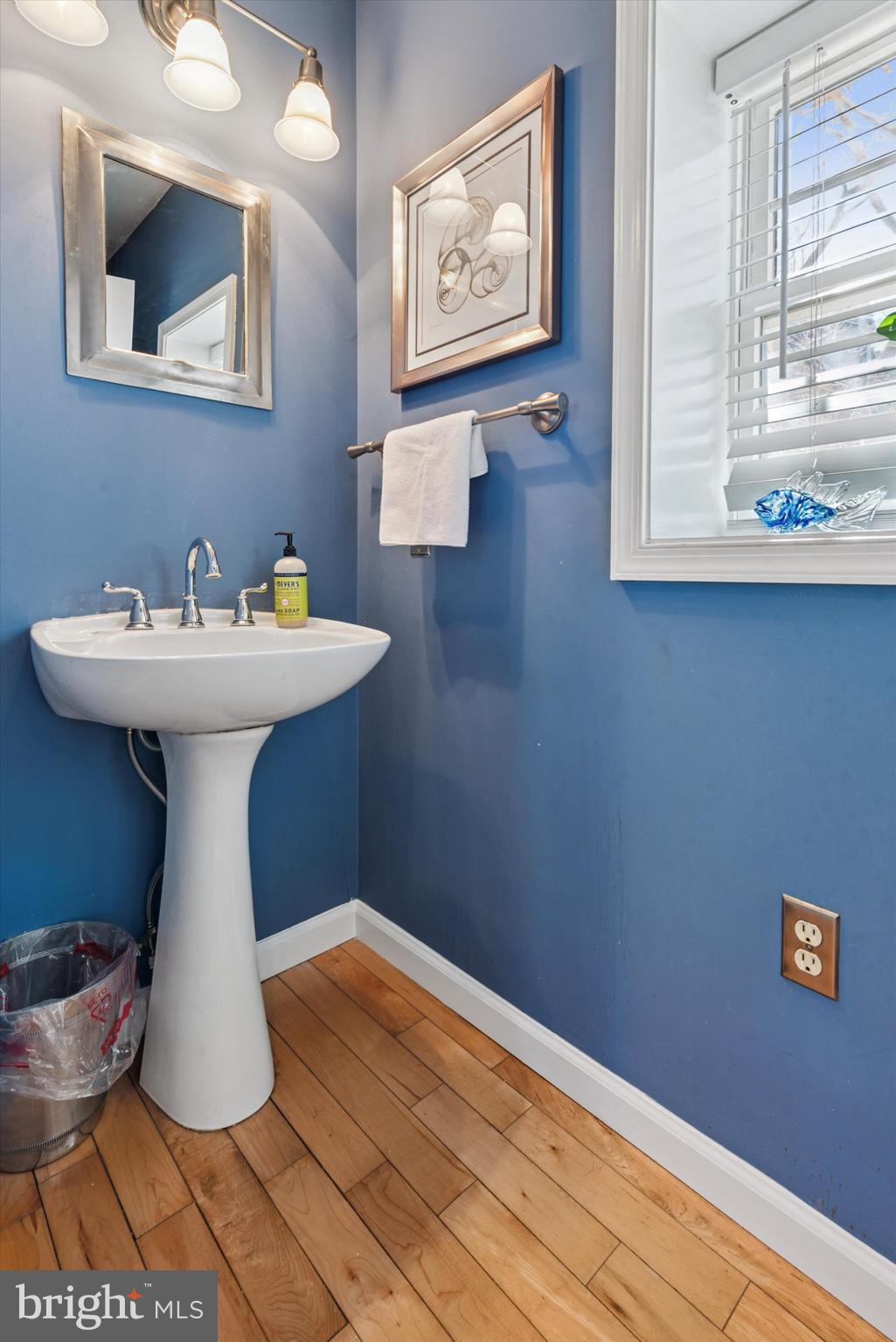 48 Old Eagle School Road Wayne, PA 19087 - Photo 14 of 33 a bathroom with a sink and a mirror