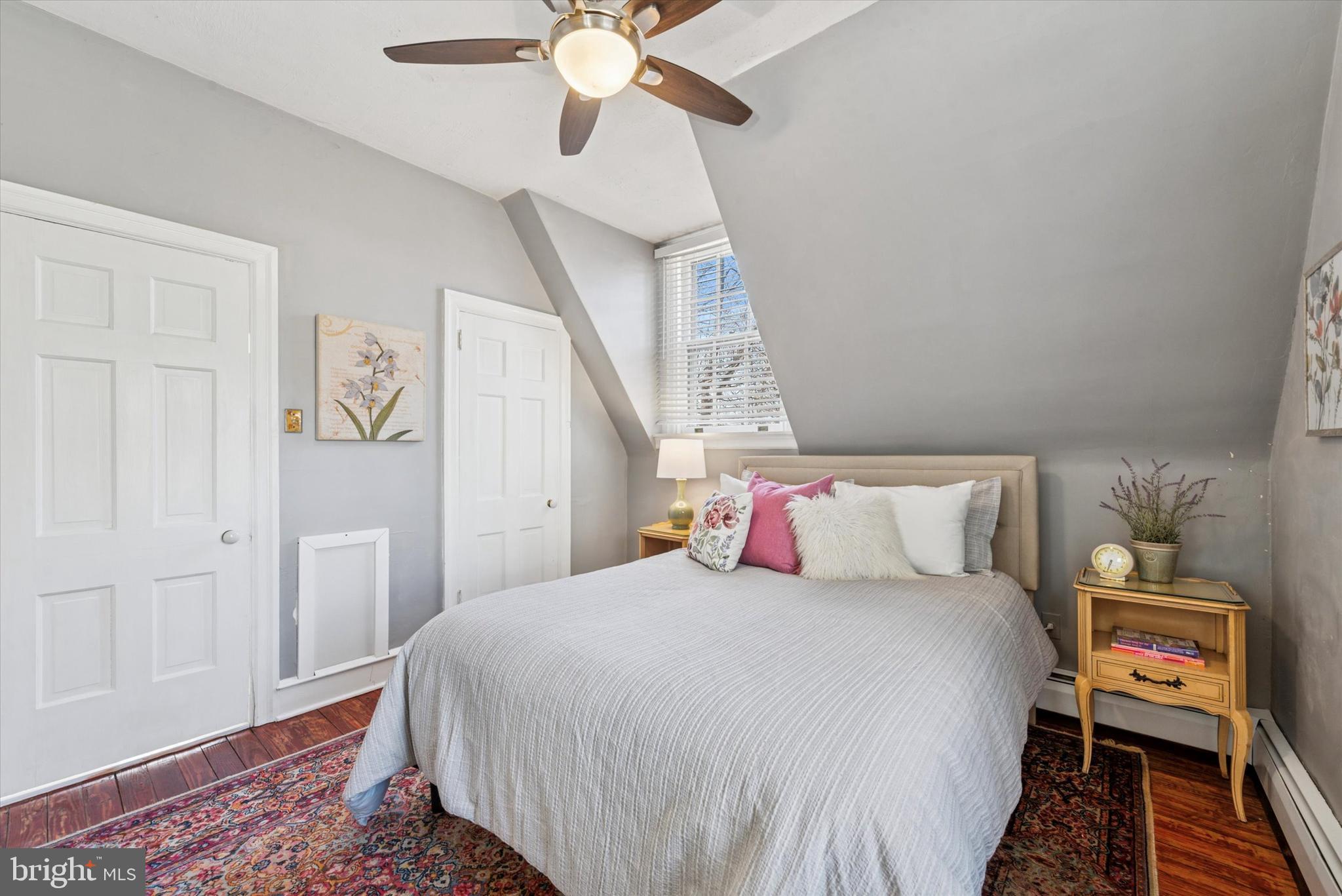 48 Old Eagle School Road Wayne, PA 19087 - Photo 19 of 33 a bedroom with a bed and a chandelier