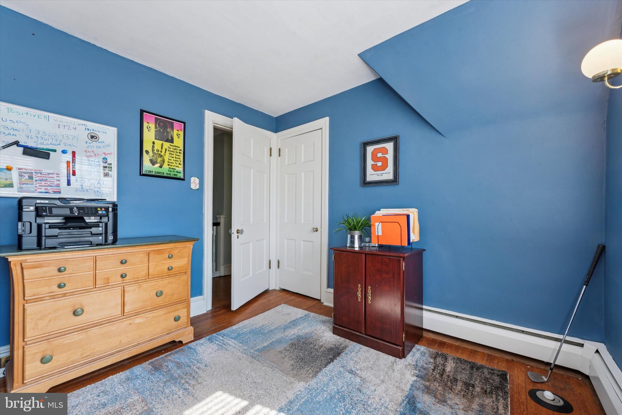 48 Old Eagle School Road Wayne, PA 19087 - Photo 25 of 33 a view of a livingroom with wooden floor and window