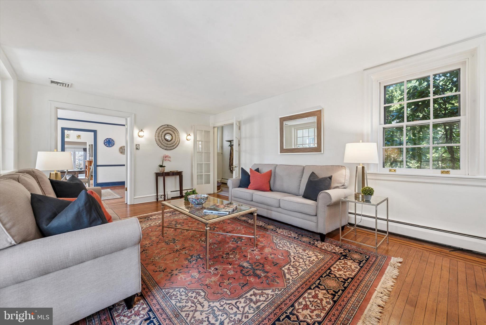 48 Old Eagle School Road Wayne, PA 19087 - Photo 7 of 33 a living room with furniture a rug and a window