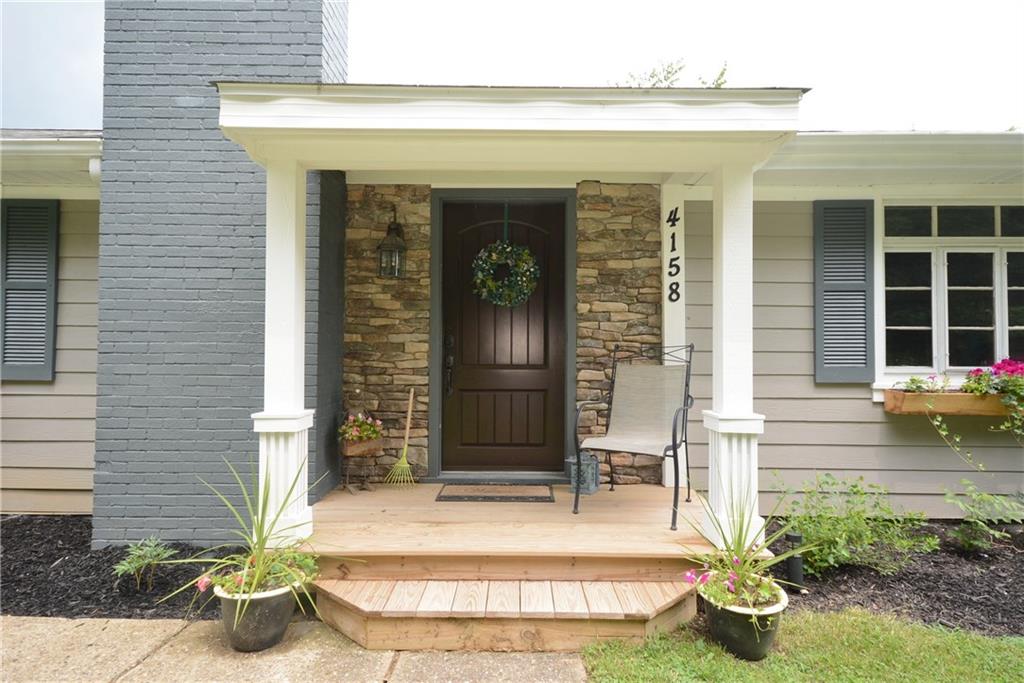 4158 Battle Ridge Road McDonald, PA 15057 - Photo 1 of 23 Quaint front porch with custom stonework and pillars to sit out or welcome your guests!