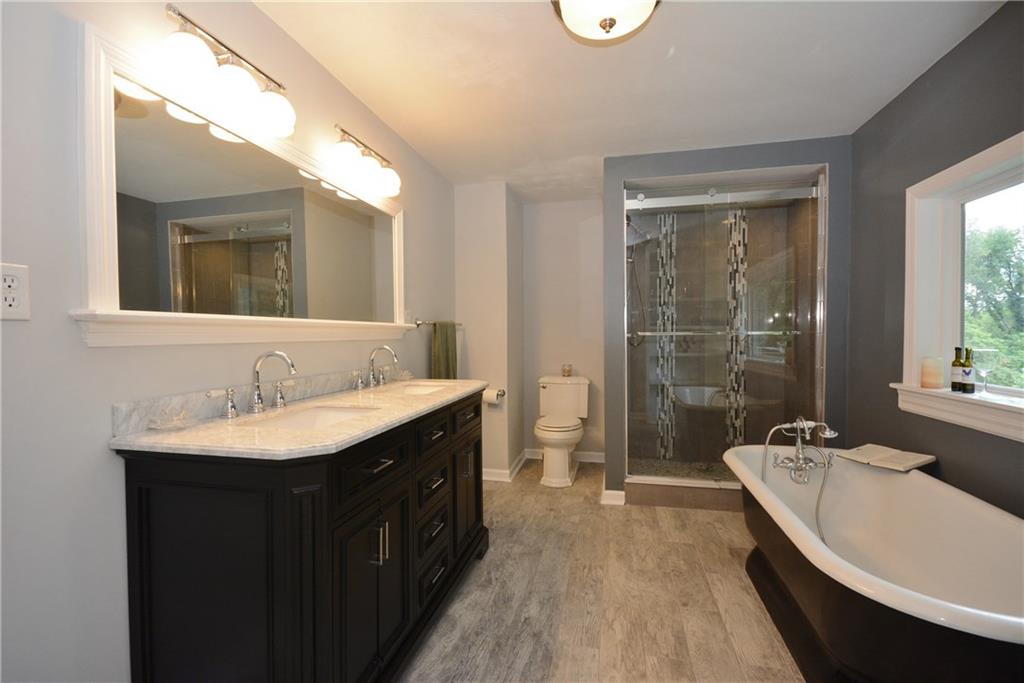 4158 Battle Ridge Road McDonald, PA 15057 - Photo 13 of 23 The master bath boosts a marble double vanity, stand alone tub and separate shower with a great view.