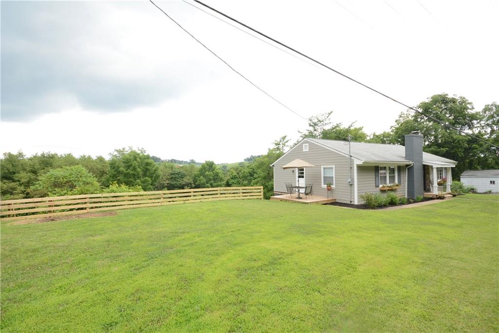 4158 Battle Ridge Road McDonald, PA 15057 - Photo 3 of 23 Plenty of space here in the side yard for kids and pets to roam and play.