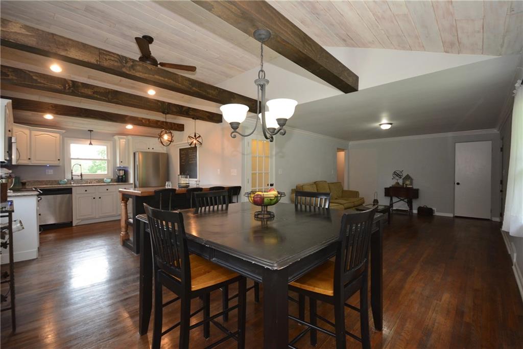 4158 Battle Ridge Road McDonald, PA 15057 - Photo 8 of 23 This dining room is open to both to the living room and kitchen for the ultimate in mingling with your company and family.