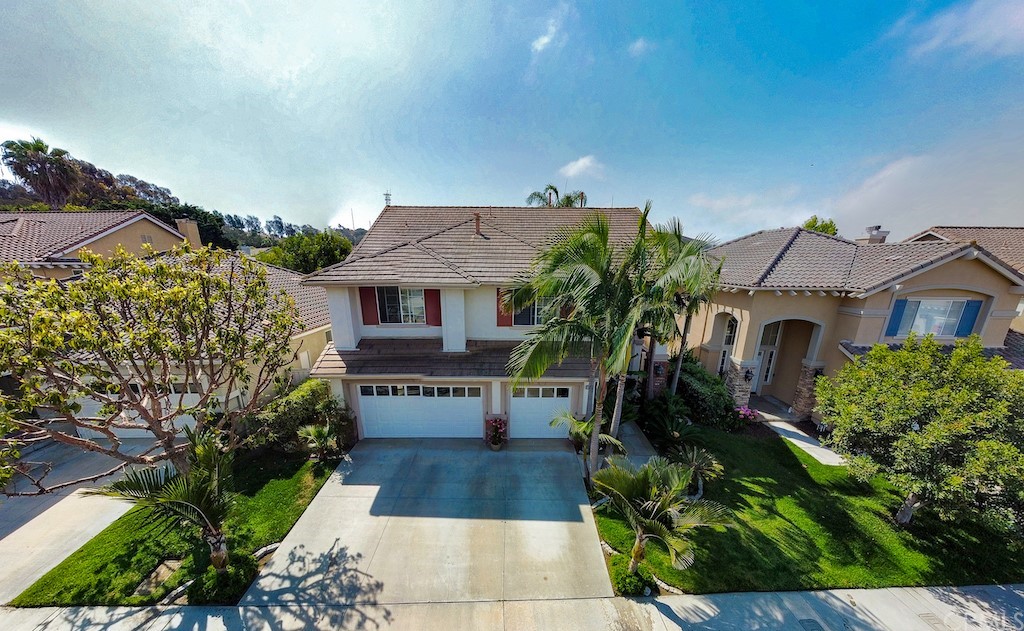 808 Carnaros San Clemente, CA 92672 - Photo 16 of 17 a front view of house with yard and green space