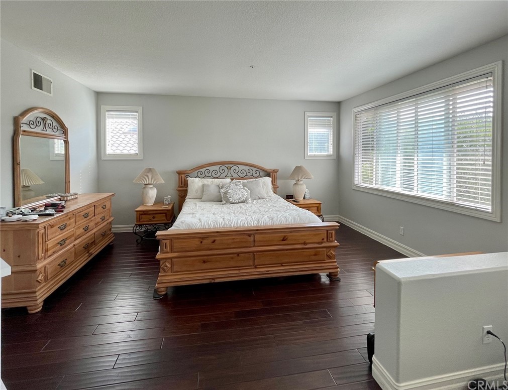 808 Carnaros San Clemente, CA 92672 - Photo 5 of 17 a bedroom with a bed and a large window