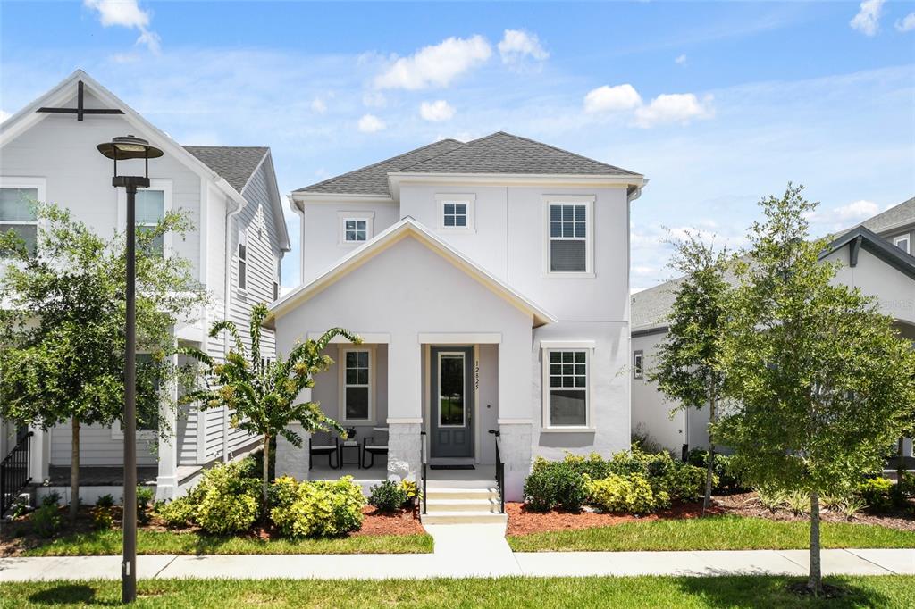 front view of a house with a yard