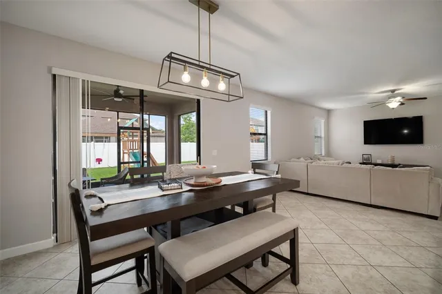 a kitchen with stainless steel appliances granite countertop a stove microwave and cabinets