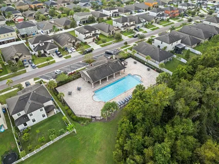 an aerial view of a house with a garden