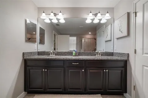 an aerial view of a house with a swimming pool