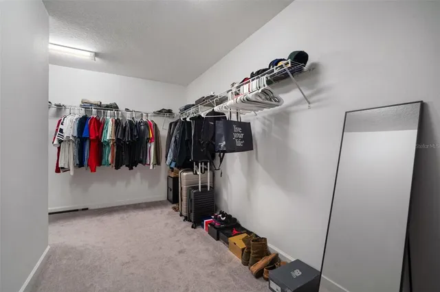 an aerial view of residential building with parking space