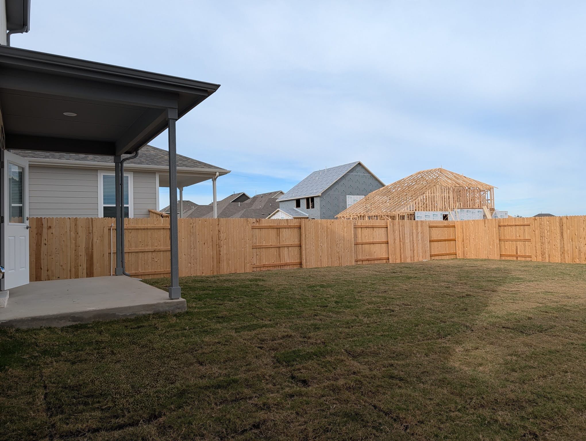 212 Daniels Dusty Trail Georgetown, TX 78626 - Photo 19 of 23 Fenced backyard featuring a patio area and a residential view