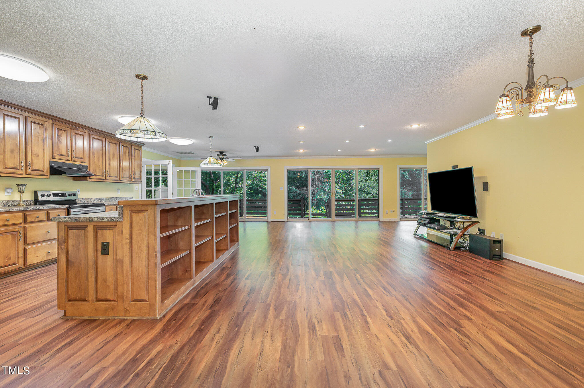 2887 Micro Road West Selma, NC 27576 - Photo 11 of 48 a view of a kitchen with wooden floor and a sink