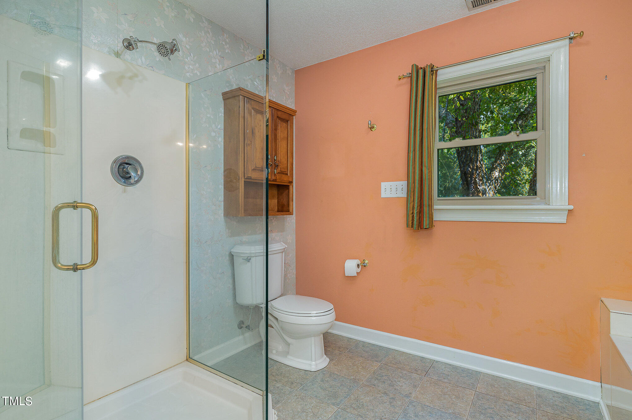 2887 Micro Road West Selma, NC 27576 - Photo 26 of 48 a bathroom with a granite countertop shower a toilet and a sink