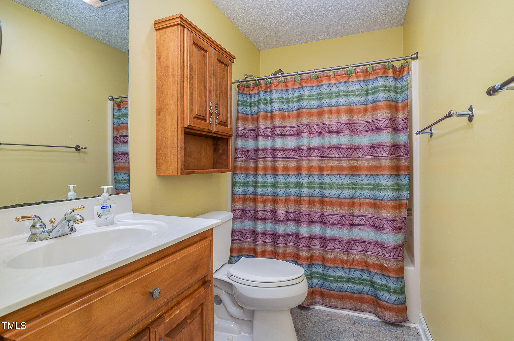 2887 Micro Road West Selma, NC 27576 - Photo 31 of 48 a bathroom with a sink toilet and shower
