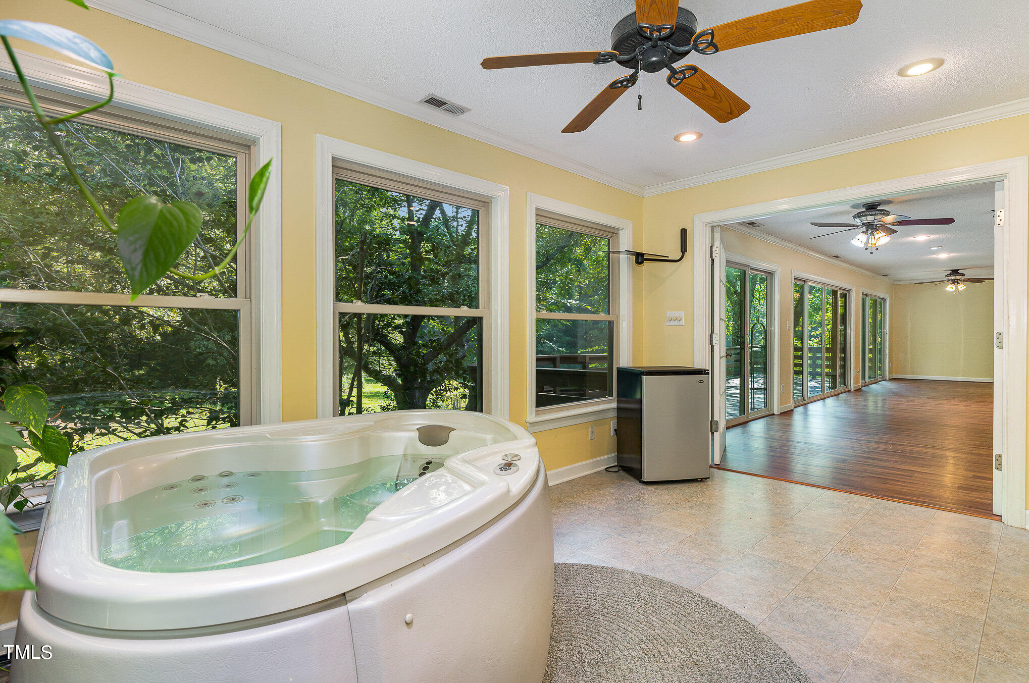 2887 Micro Road West Selma, NC 27576 - Photo 33 of 48 a floor to ceiling window and a chandelier