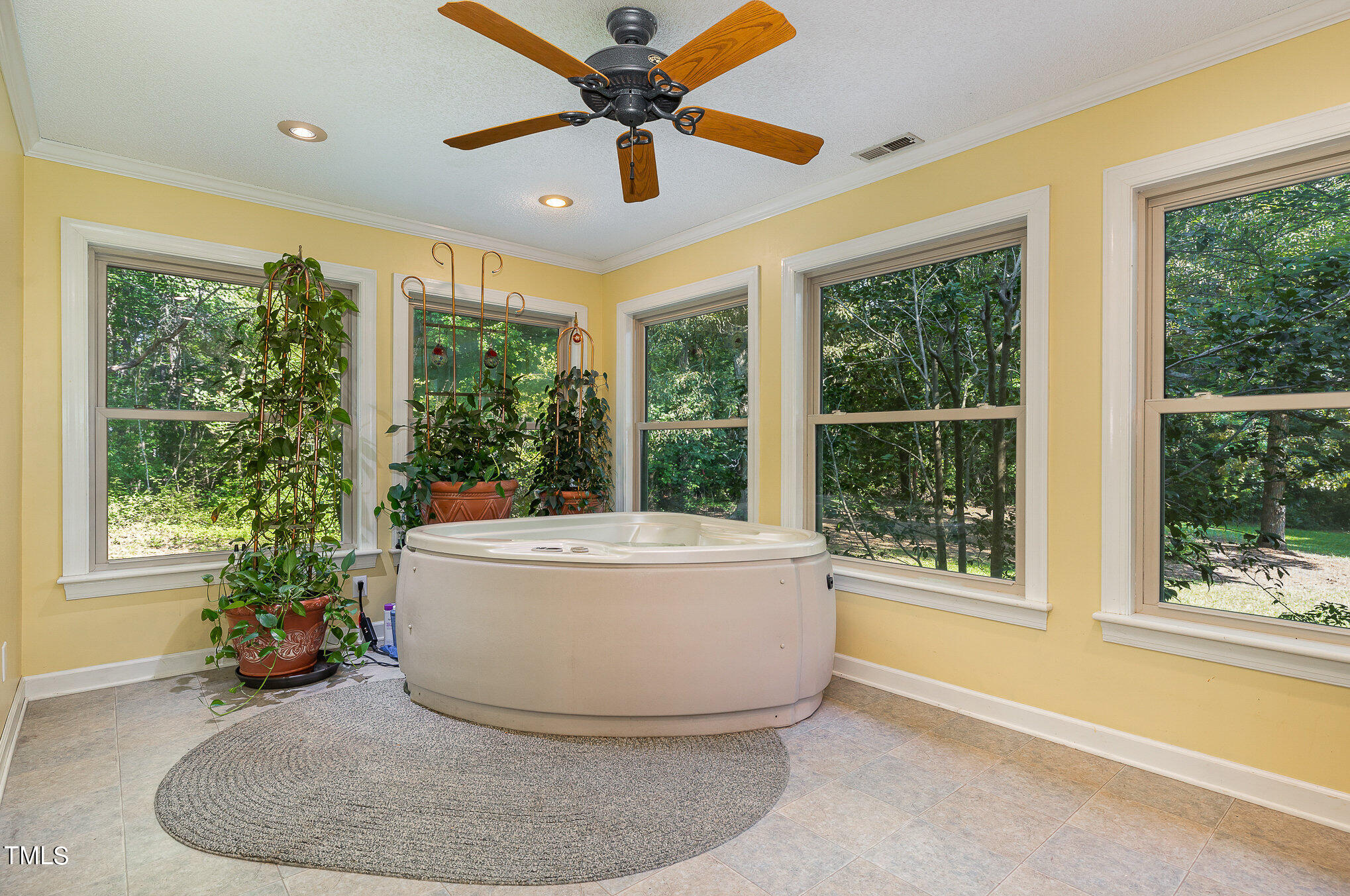 2887 Micro Road West Selma, NC 27576 - Photo 34 of 48 a living room with large window and a dining table