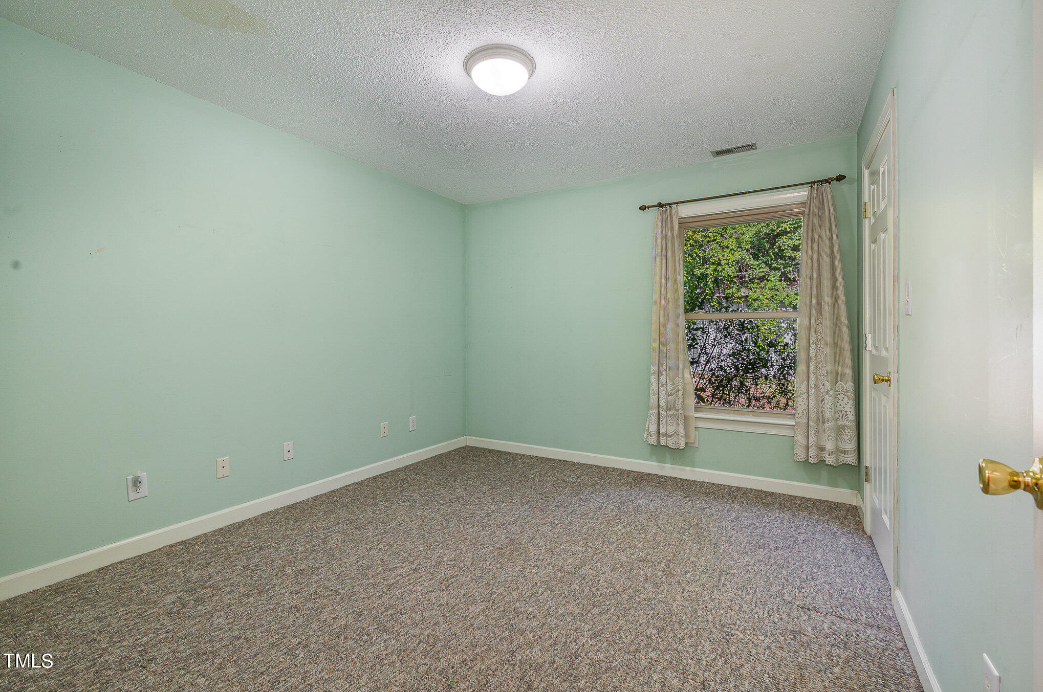 2887 Micro Road West Selma, NC 27576 - Photo 35 of 48 an empty room with a window
