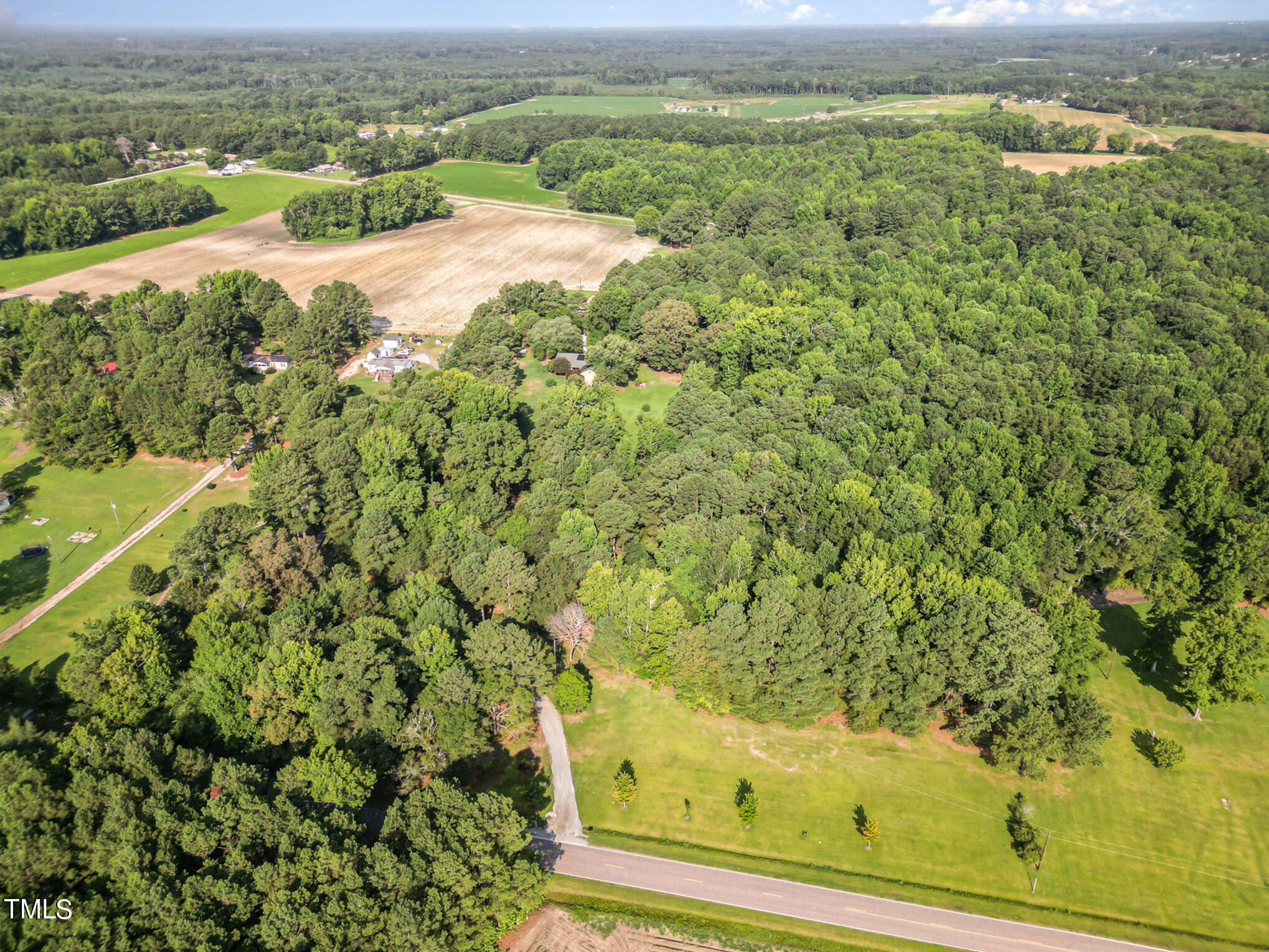 2887 Micro Road West Selma, NC 27576 - Photo 46 of 48 a view of a yard with an outdoor space
