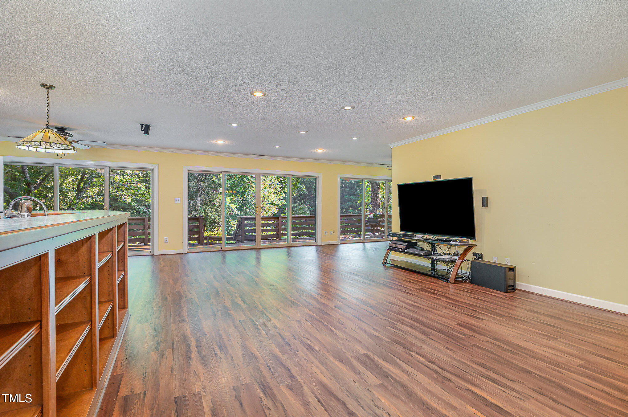 2887 Micro Road West Selma, NC 27576 - Photo 10 of 48 a living room with furniture and a flat screen tv
