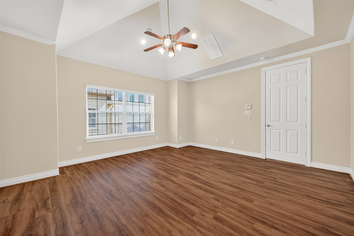 5938 Kansas Street Houston, TX 77007 - Photo 14 of 30 wooden floor in an empty room with a window