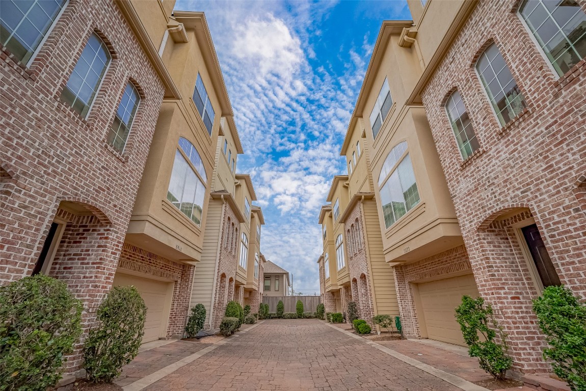 5938 Kansas Street Houston, TX 77007 - Photo 18 of 30 a view of a brick building next to a road