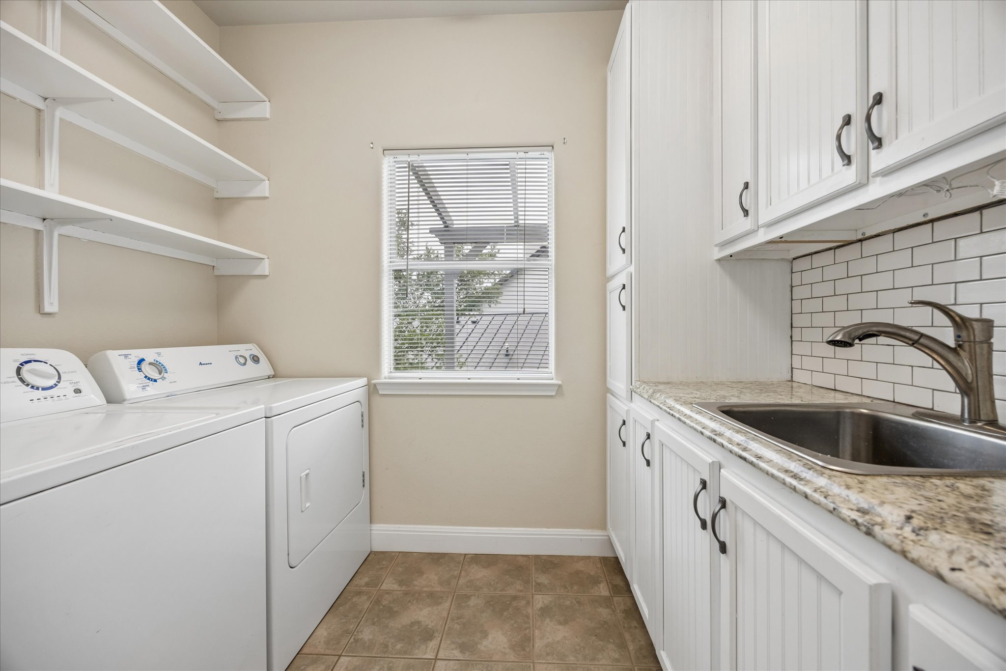 313 South Flamingo Drive Austin, TX 78734 - Photo 22 of 24 Nice conveniences in the laundry room.