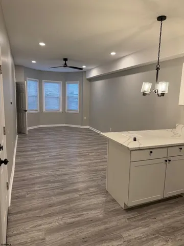 a hallway with a wooden floor