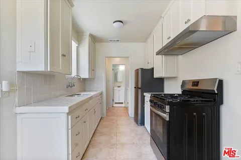 $985,500 | 4021 Degnan Boulevard, Los Angeles, CA 90008
