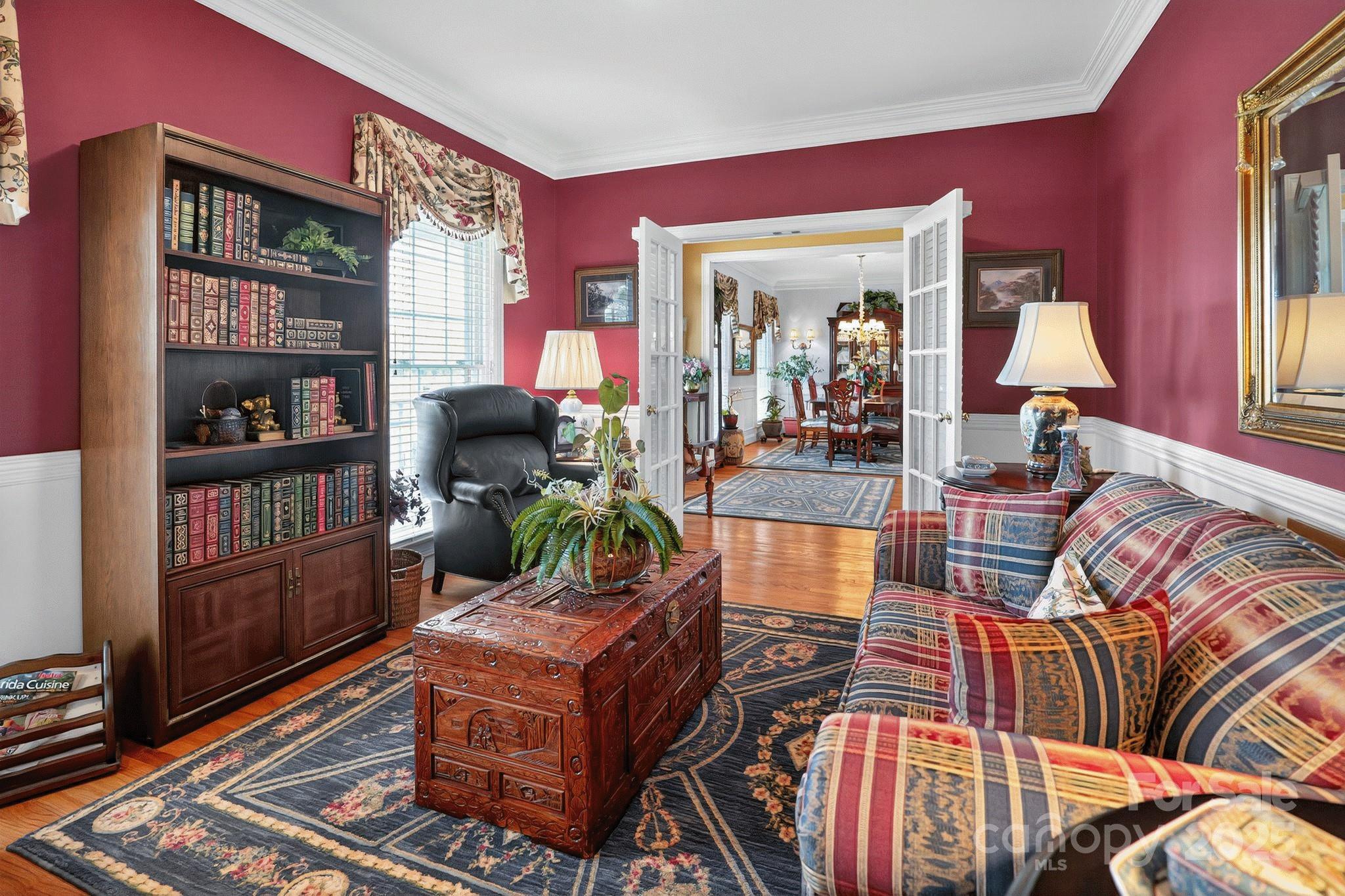1004 Brockman Road Greer, SC 29651 - Photo 11 of 46 a living room with furniture fireplace and book shelf