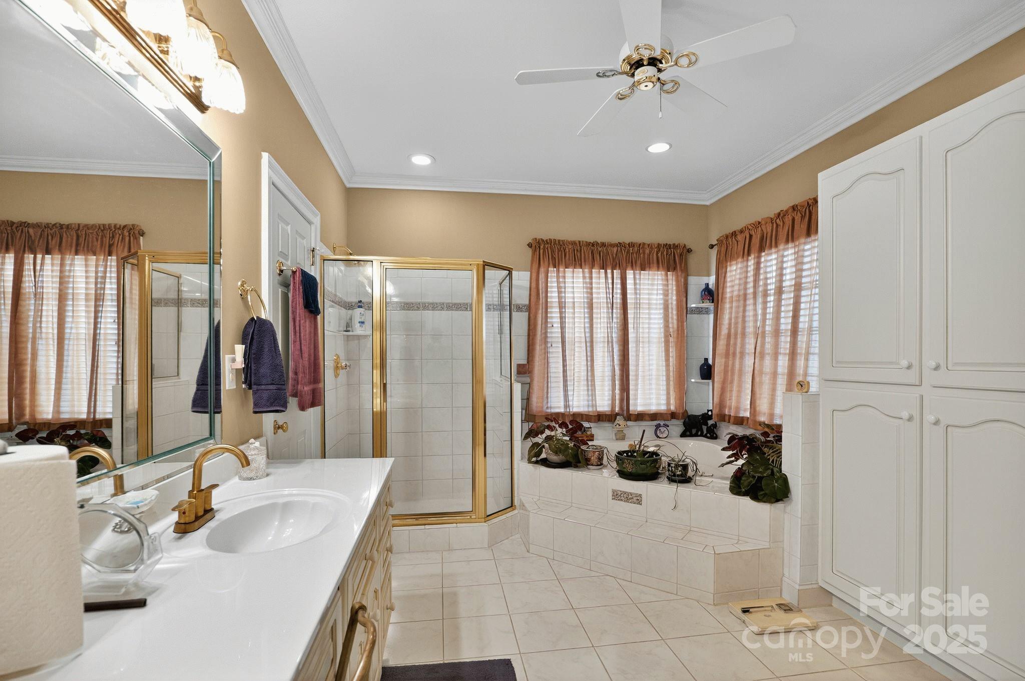 1004 Brockman Road Greer, SC 29651 - Photo 17 of 46 a bathroom with a double vanity sink and a mirror