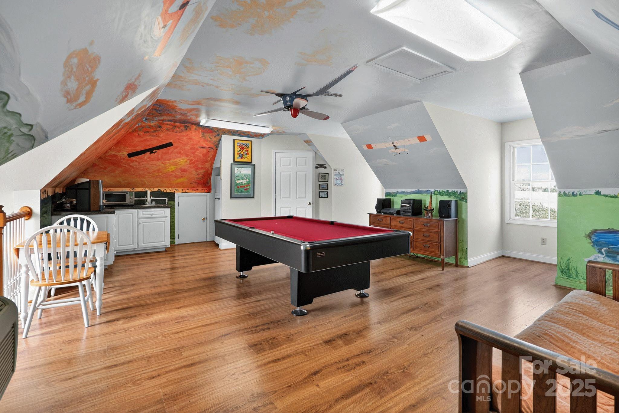 1004 Brockman Road Greer, SC 29651 - Photo 27 of 46 a living room with furniture and wooden floor