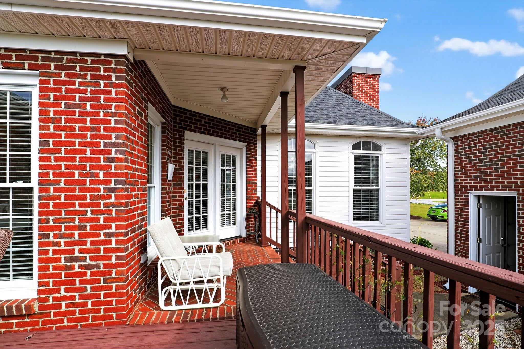 1004 Brockman Road Greer, SC 29651 - Photo 39 of 46 a view of a patio with a table and chairs