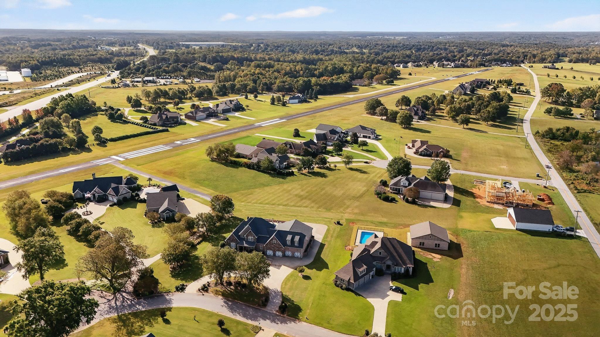 1004 Brockman Road Greer, SC 29651 - Photo 4 of 46 an aerial view of residential houses with outdoor space
