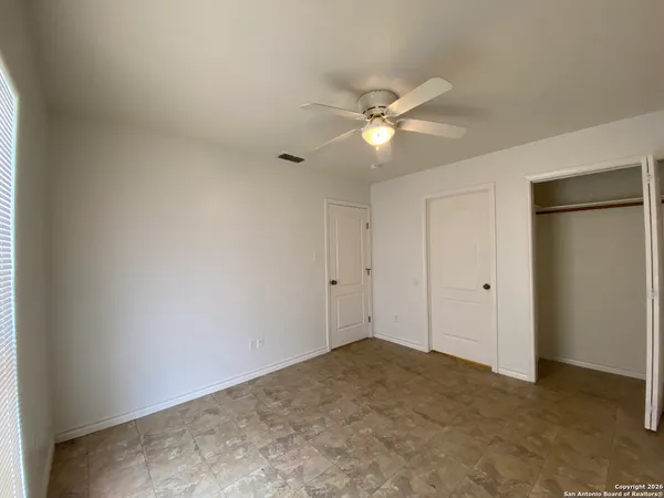 a view of a big room with carpet