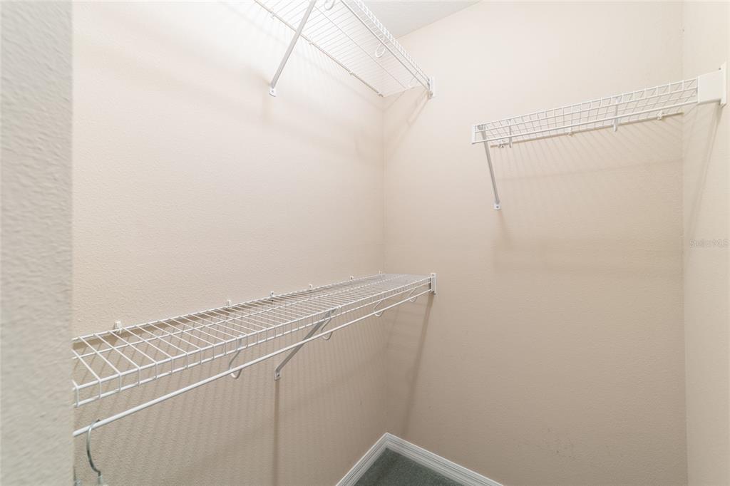 16369 Southwest 14th Avenue Road Ocala, FL 34473 - Photo 33 of 49 a view of a room with racks on the wall